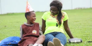 slum2school volunteer inemo and our beneficiary (1)